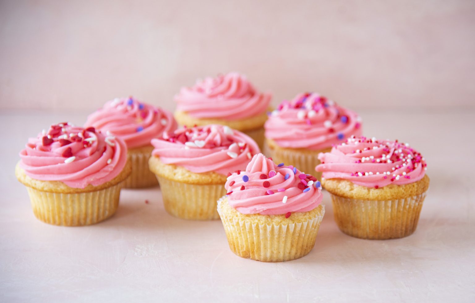 Pink Vanilla-Vanilla Cupcakes with lots of Pink Sprinkles