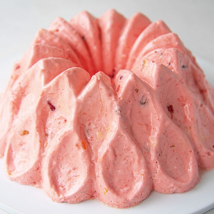 https://www.sweetrecipeas.com/wp-content/uploads/2020/12/Bourbon-Fruitcake-Jell-O-Mold-Slider-720x720.jpeg