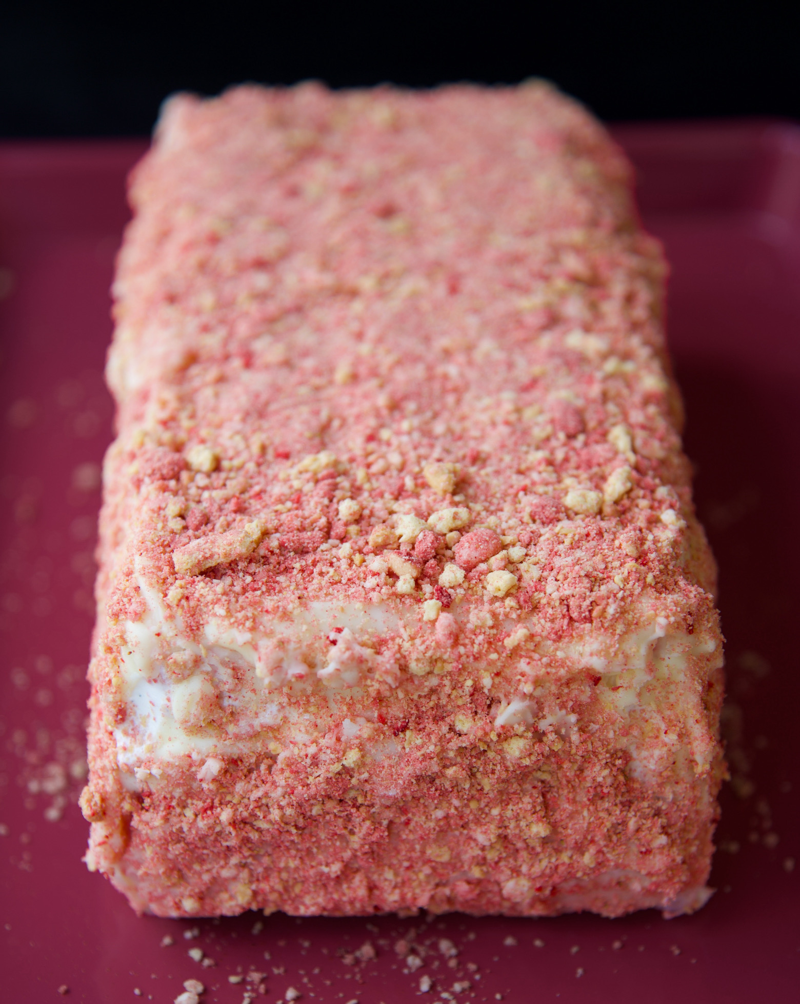 Close up of the whole Strawberry Shortcake Ice Cream Terrine showing the crumble pieces on top. 